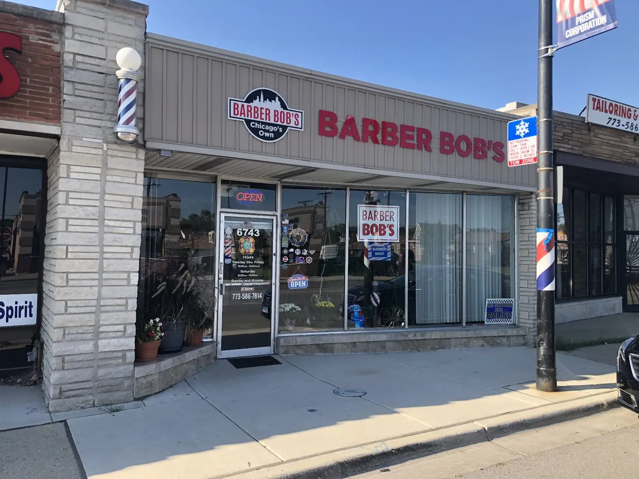 Barber Bob’s storefront on Archer Avenue with its barber pole